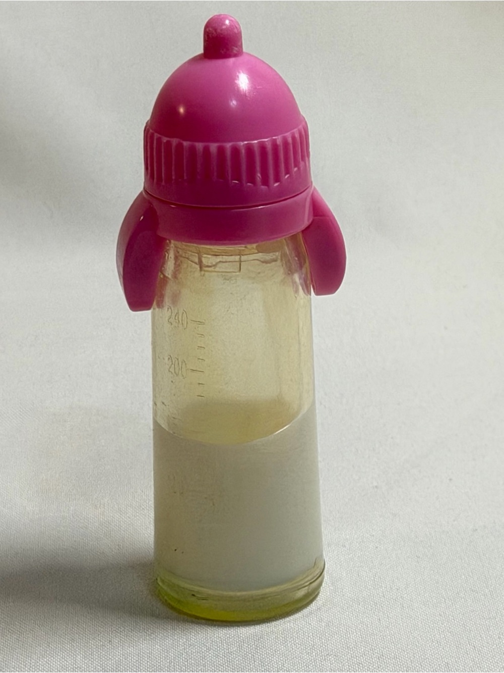 Vintage Baby Doll Disappearing Milk Bottle